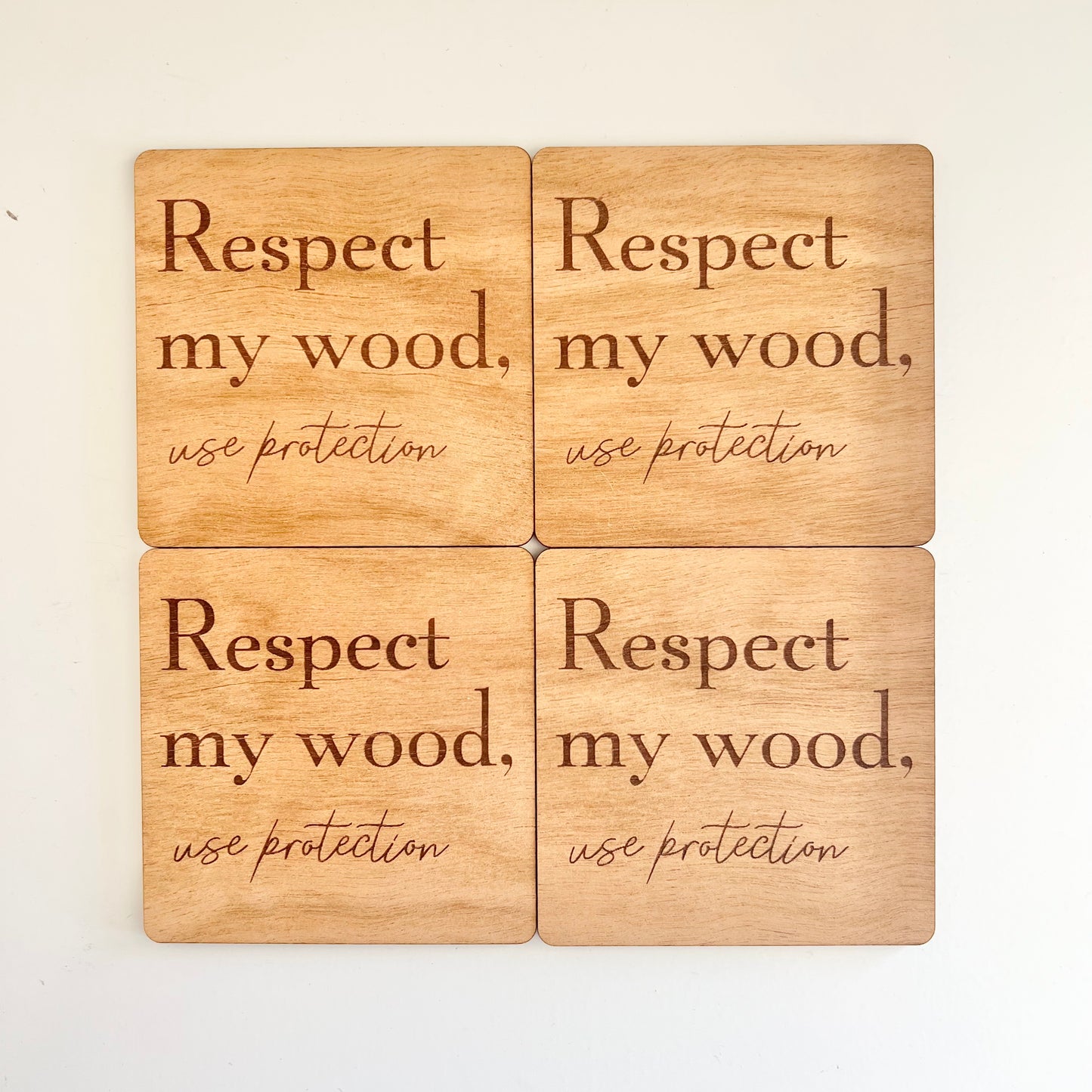 Respect my wood, use a coaster