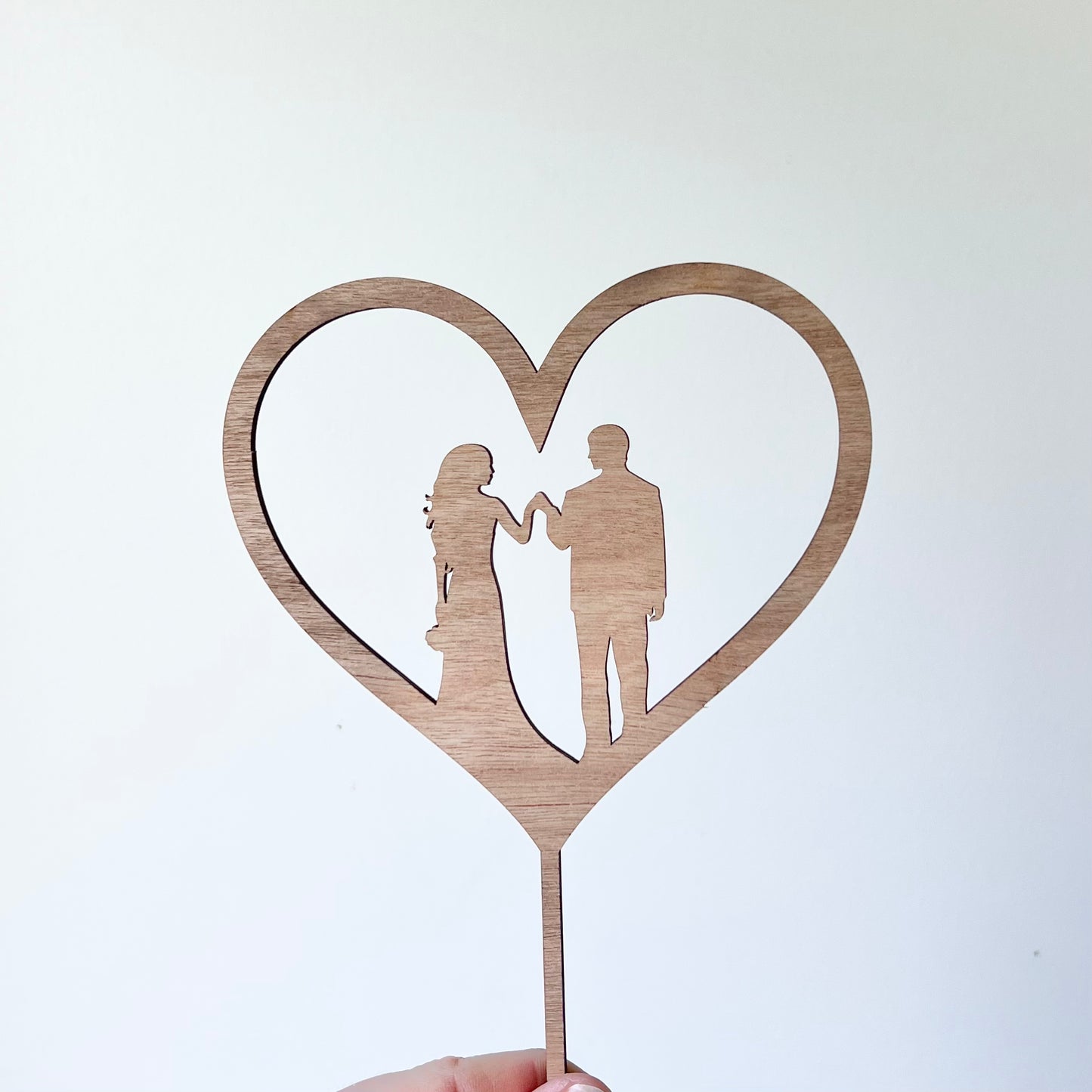 Bride, Groom in heart silhouette topper