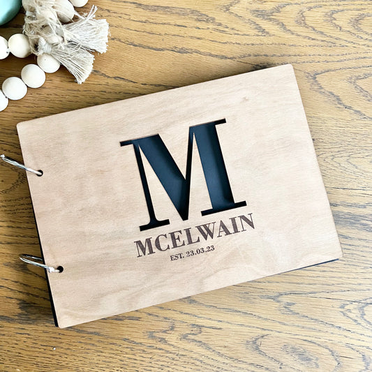 Initial cut out Guest Book