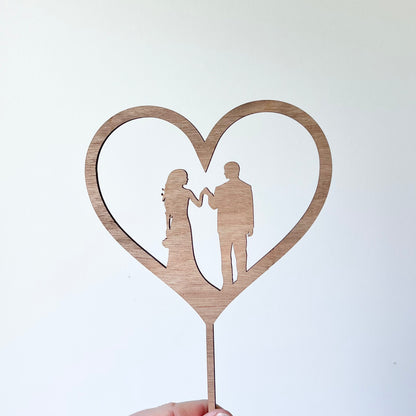 Bride, Groom in heart silhouette topper