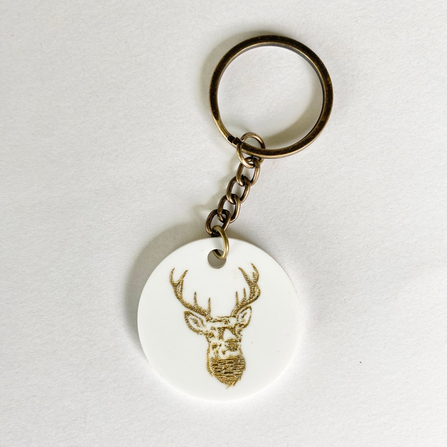 Gold stag on white