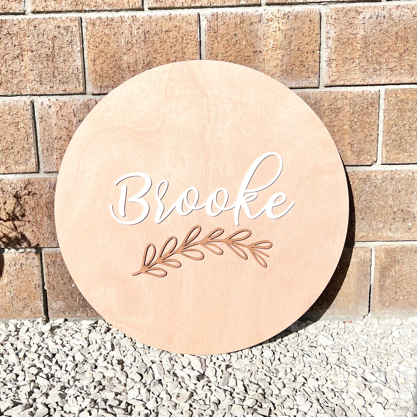 Round name plaque in wood with acrylic 600mm