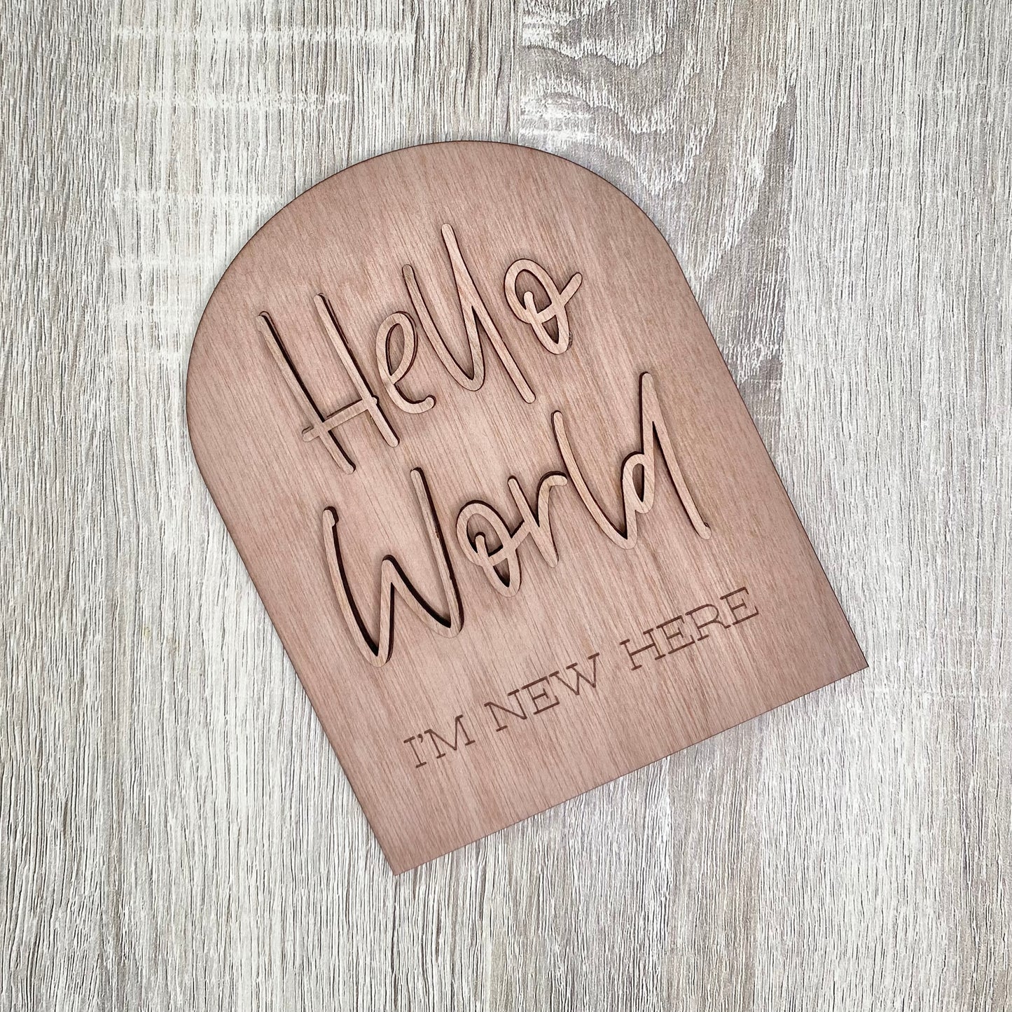 Hello world plaque with wooden accent
